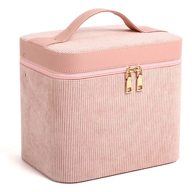Large corduroy cosmetic storage box with solid colour exterior and polyester cotton lining.