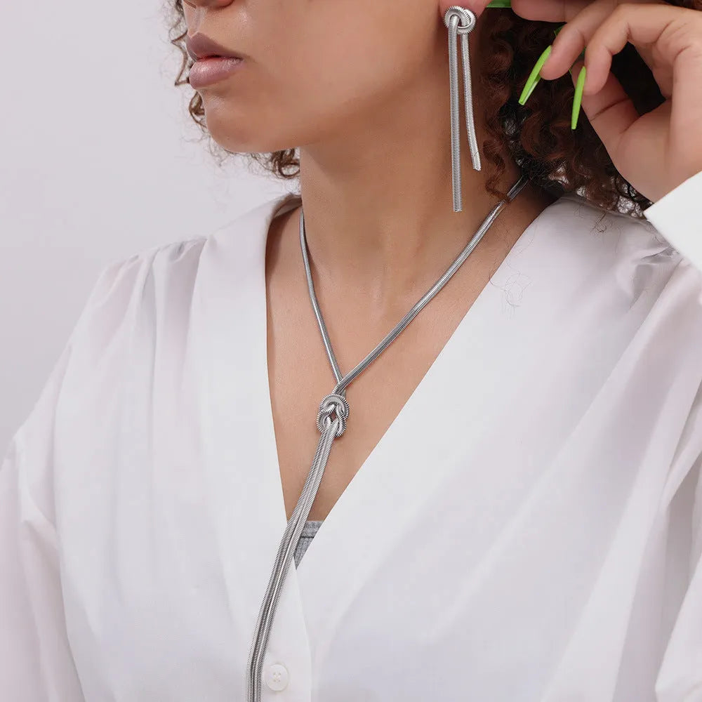 Gold electroplated titanium steel knotted tassel snake chain necklace with matching earrings set
