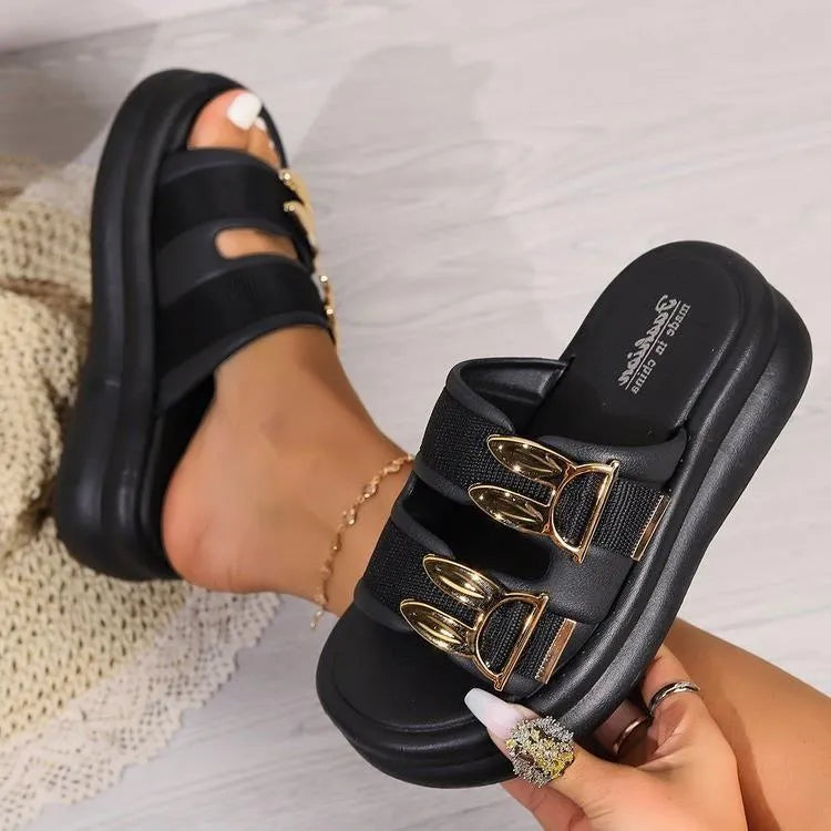 Women's apricot suede slippers with a thick rubber sole, shown on a white background.