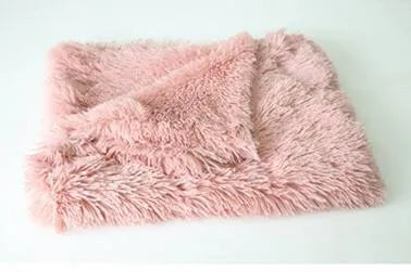 Long plush pet blanket in wool polyester blend showing dark grey, light grey and white colour options with size comparison