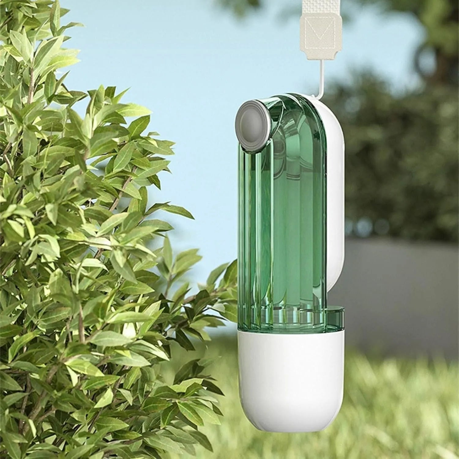 Foldable dog water bottle with food dispenser in beige colour for outdoor walking