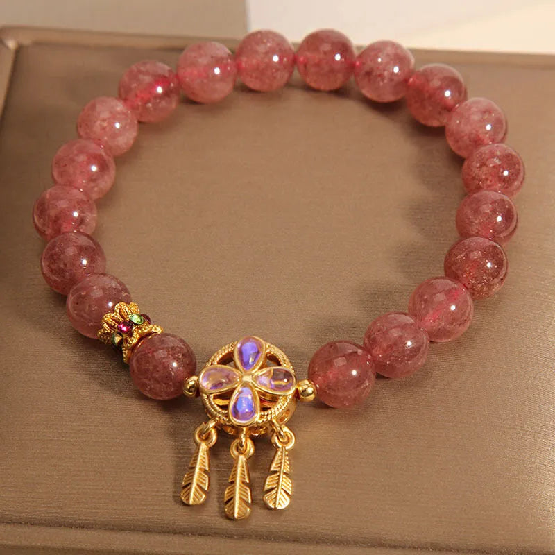 Women's strawberry quartz crystal bracelet with four-leaf clover dream catcher pendant