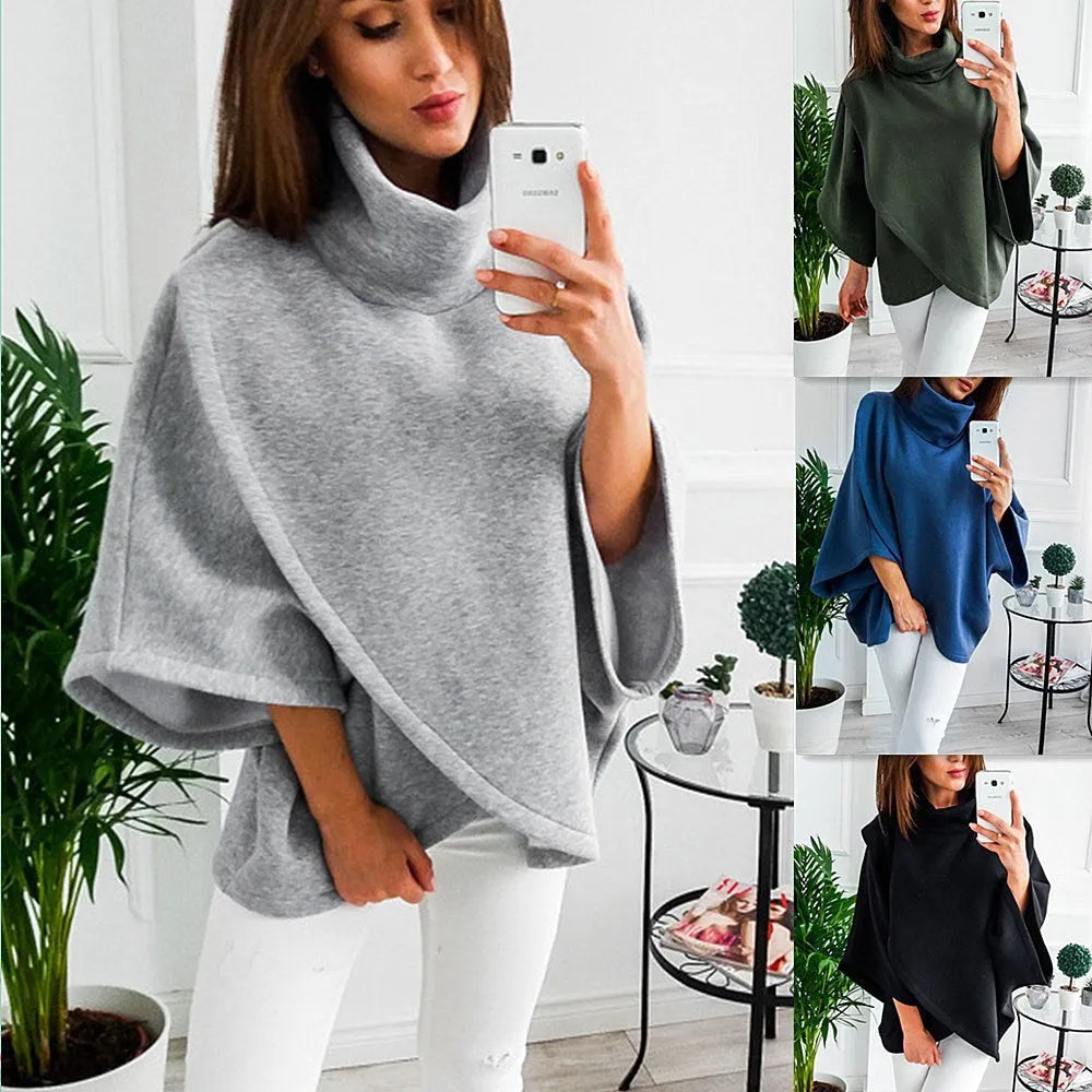 Women's long grey batwing cardigan with three buttons and stitching detail.