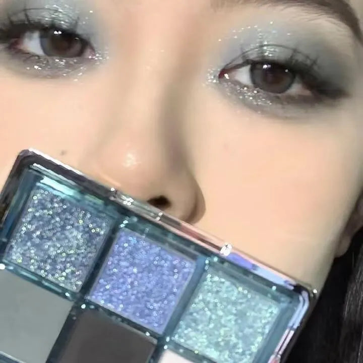 MUGELEEN nine-colour eye shadow palette 08 showing matte and shimmer shades including smoked blue.