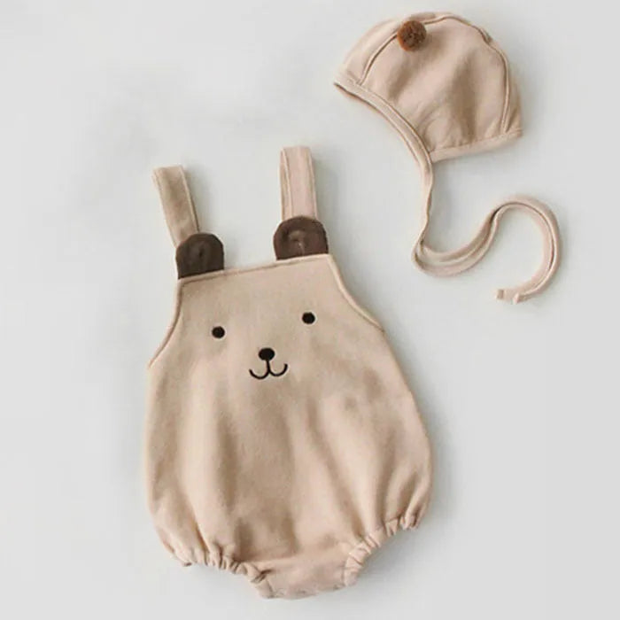 Baby sleeveless cotton robe with detachable hood in white on a soft background