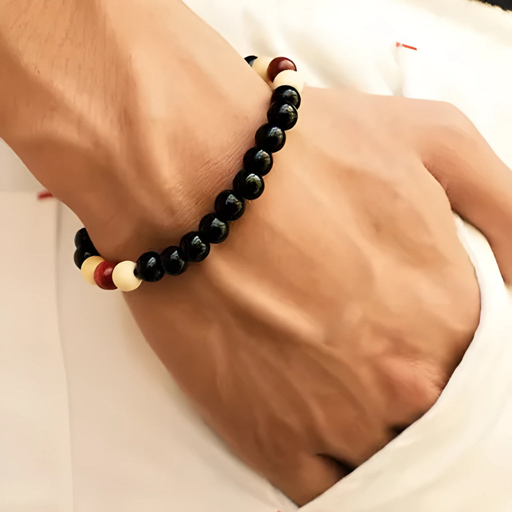 Natural stone beaded bracelet with ethnic design showing lava beads for essential oils