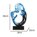 Transparent resin craft ornament in modern simplicity style on a shelf, shown in blue and orange red colour options.