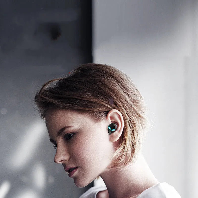 Creative Outer T8 Starman alien-design Bluetooth headset with wireless charging case
