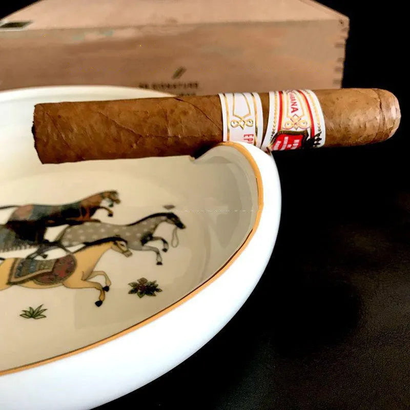 Bone ceramic cigar ashtray 175mm with hand-painted gold rim and horse motif on white background