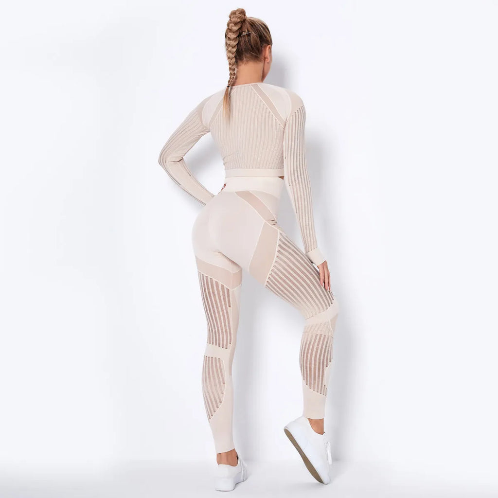 Woman wearing a long-sleeved seamless knitted yoga wearsuit in a stripe pattern, demonstrating a yoga pose.
