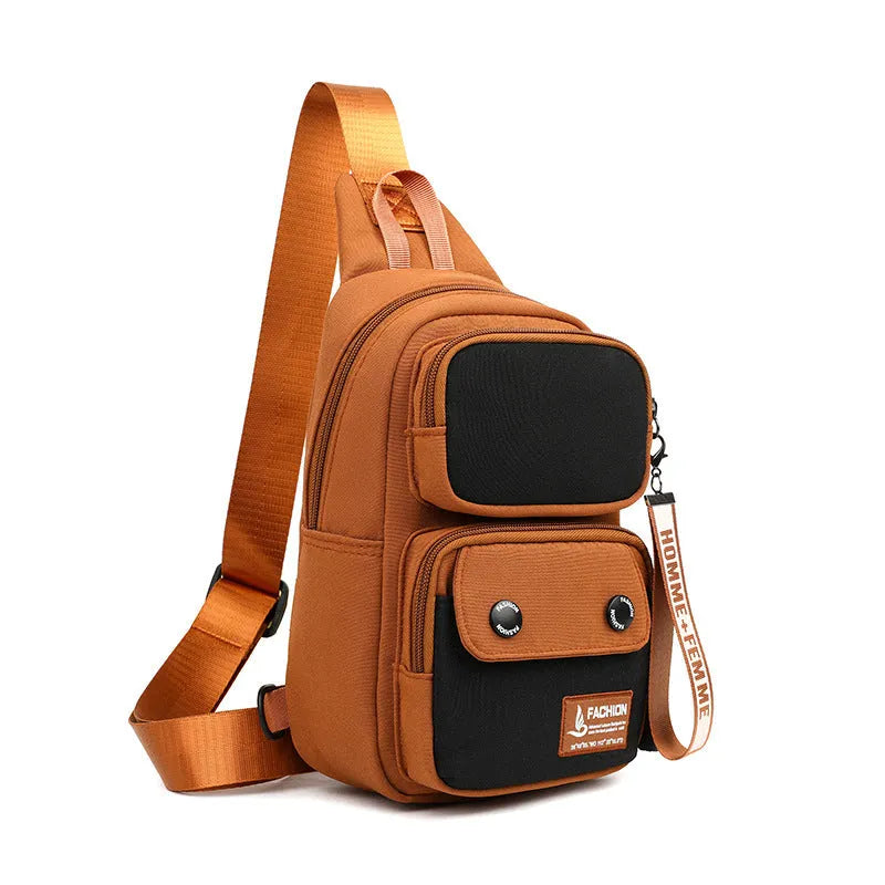 Black nylon crossbody shoulder bag with beige contrast stitching and multiple storage compartments
