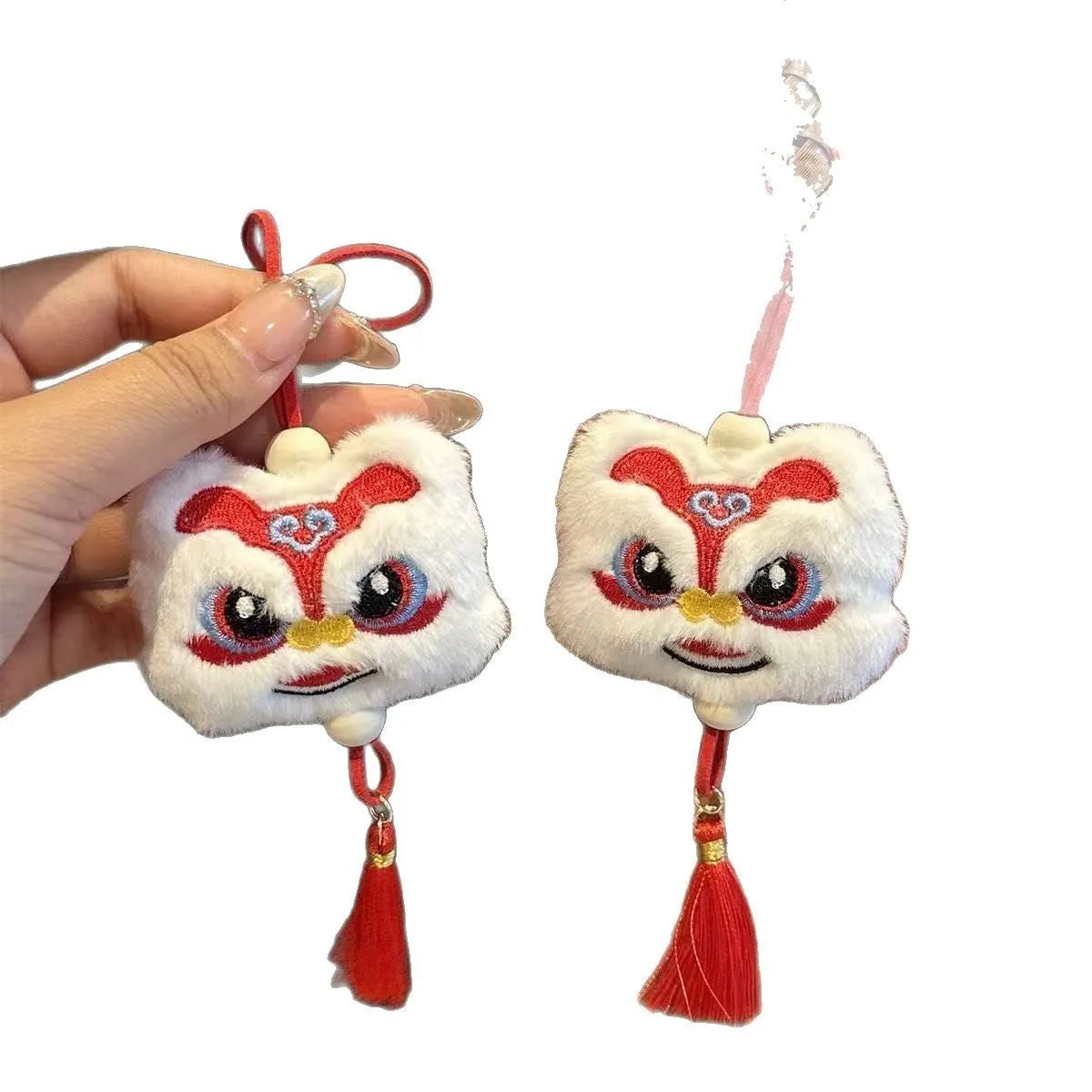 Chinese style plush lion tassel keychain ornament with star stone detail in blue or yellow