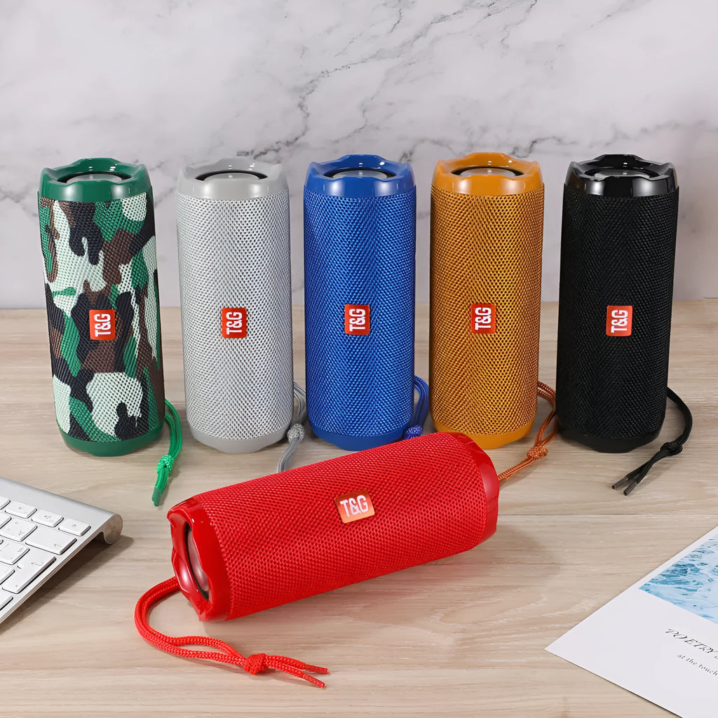 Fabric-covered portable Bluetooth speaker with integrated card holder in choice of colours.