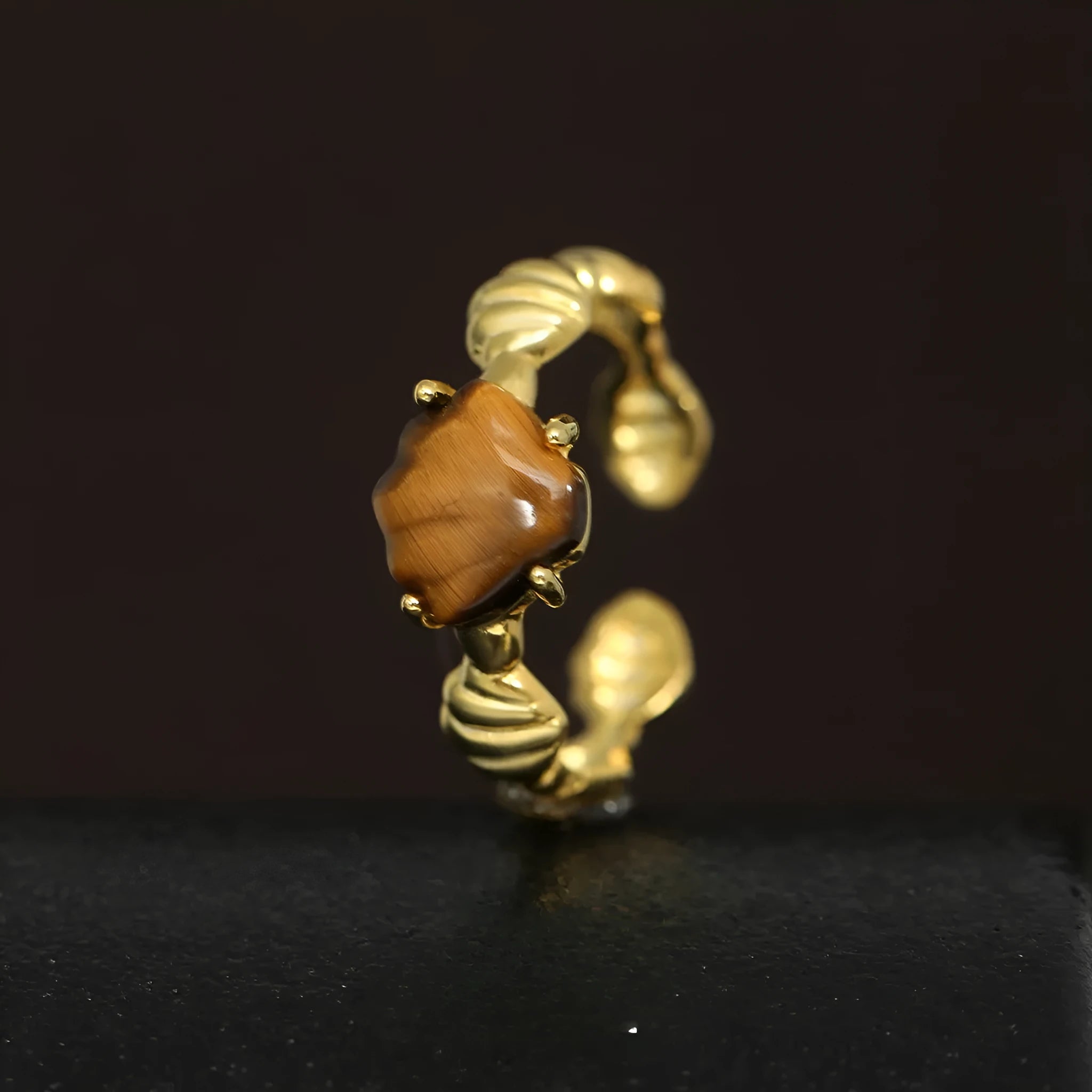 Women's adjustable sterling silver ring with shell decoration and tiger eye stone in original cold-style design