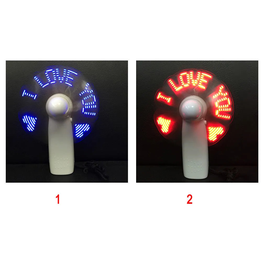 White handheld mini fan with LED lights displaying love pattern and I love you message
