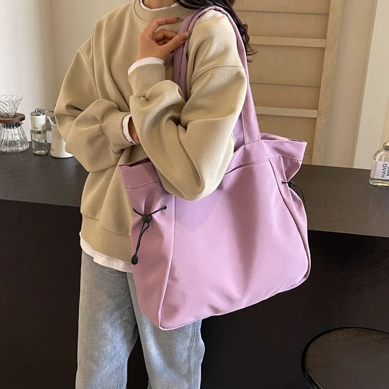 Soft Oxford cloth folding commuter tote bag in street style design showing colour options