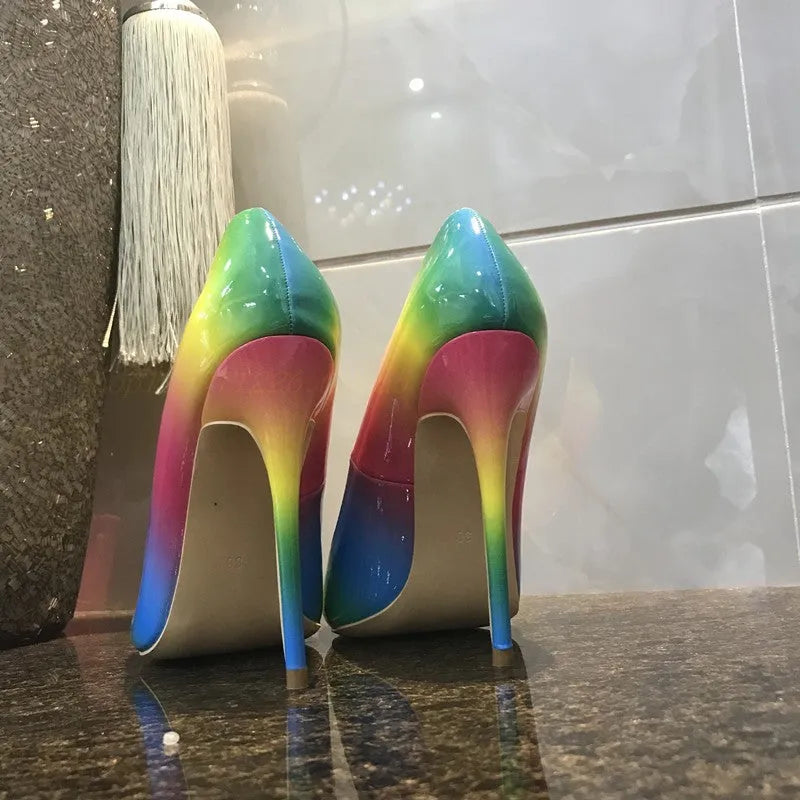Rainbow coloured women's patent leather sandals with a pointed toe and an ultra-high thin heel.