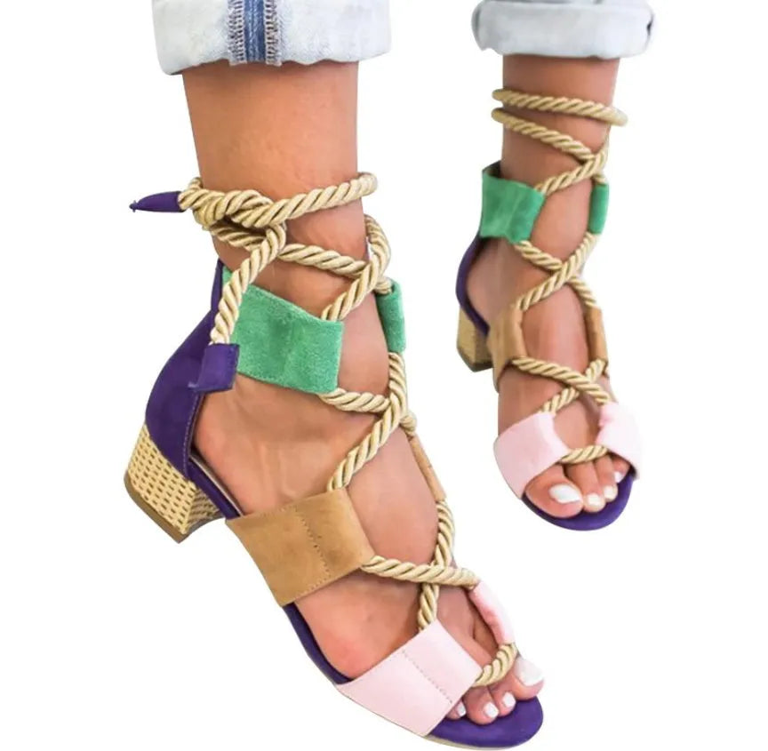 Women's beige suede fashion sandals with ankle strap and fish mouth toe on a rubber sole.