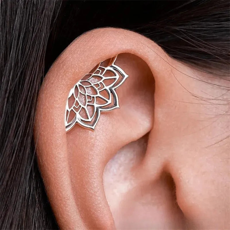 Geometric spider web stud earrings in gold and silver electroplated metal finishes