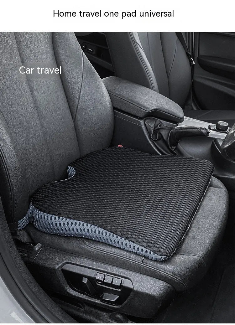 Memory foam car and office chair cushion with an attached fixed strap in a solid colour.
