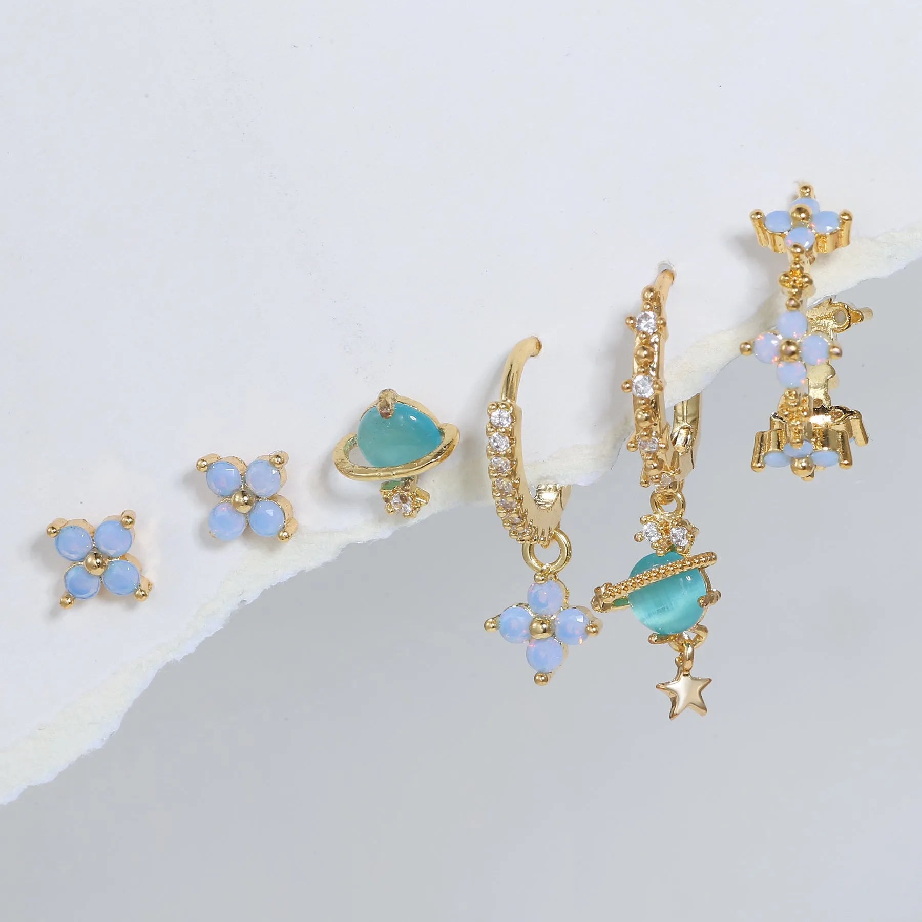 Gold and silver flower stud earrings with zircon mosaic detail in Japanese Korean style