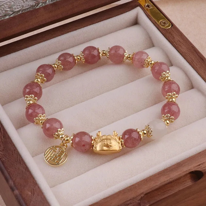 Niche Girlfriends Ice Crack Floral glazed bracelet with red, pink, and white glass beads and a zodiac charm.