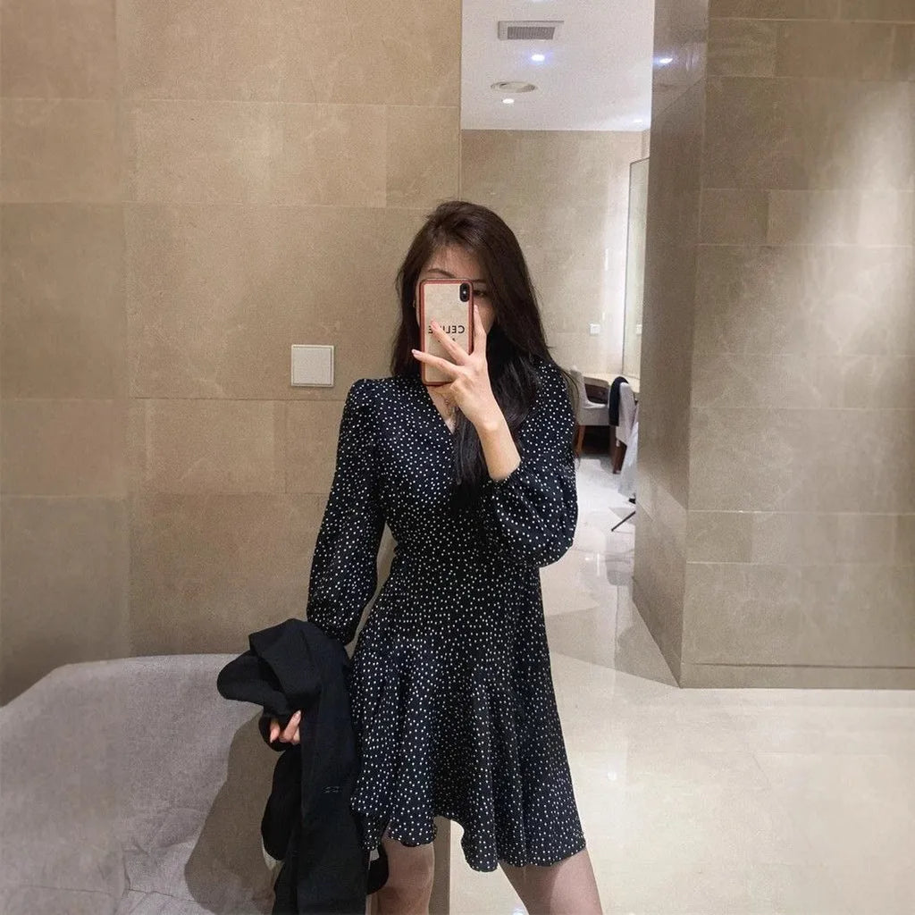 Women's black polka dot high waist midi dress with long sleeves in pullover style polyester fabric