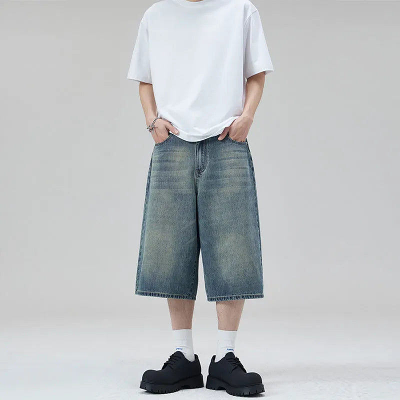 Men's straight-leg denim shorts in light blue with cropped ankle length