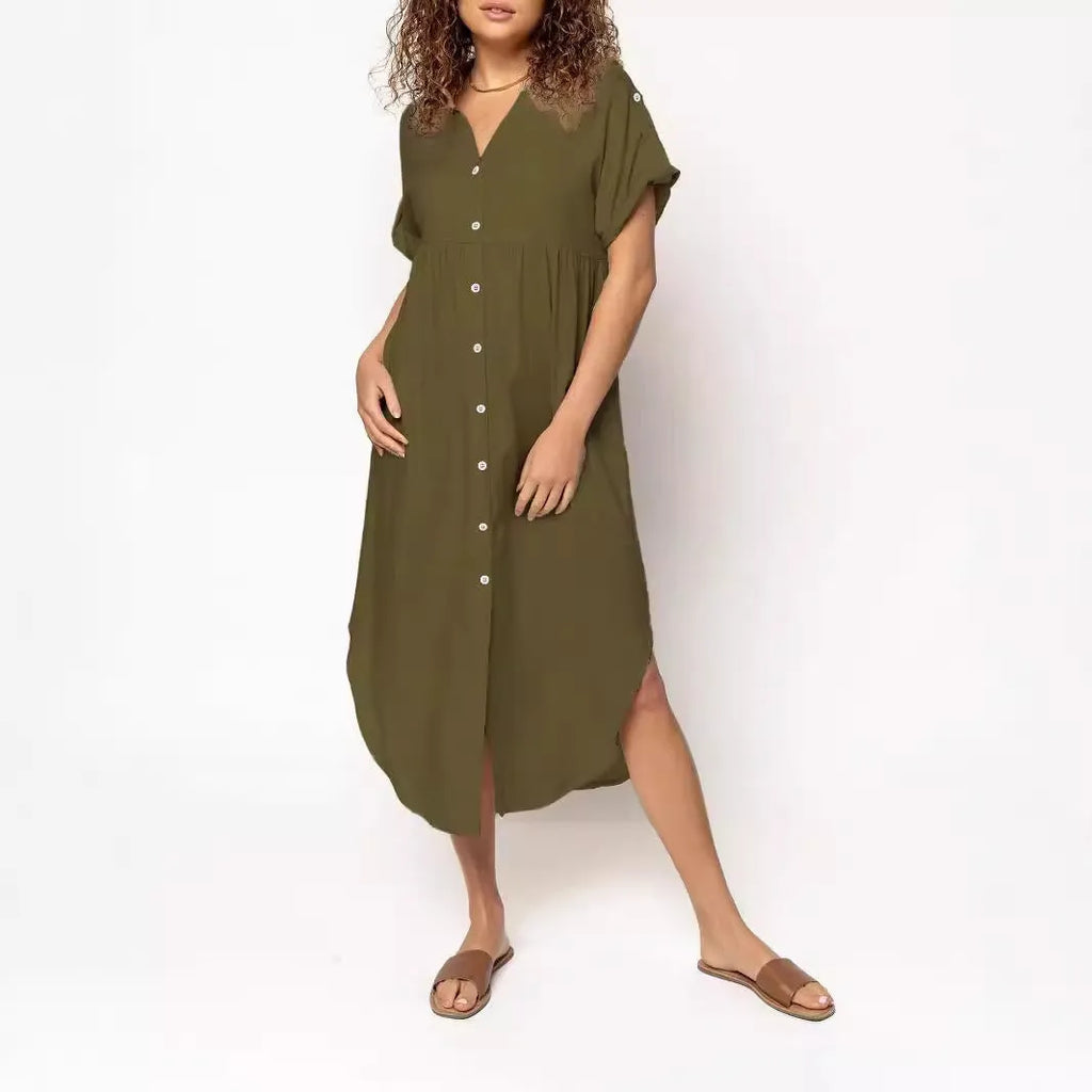 A loose-fitting, solid colour mid-length casual dress with a button-down front and regular sleeves.