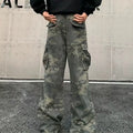 A pair of washed camouflage print cargo pants with multiple pockets on a mid-waist, showing the full trouser length.