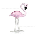 Pink crystal flamingo decorative ornament on table with modern simple design