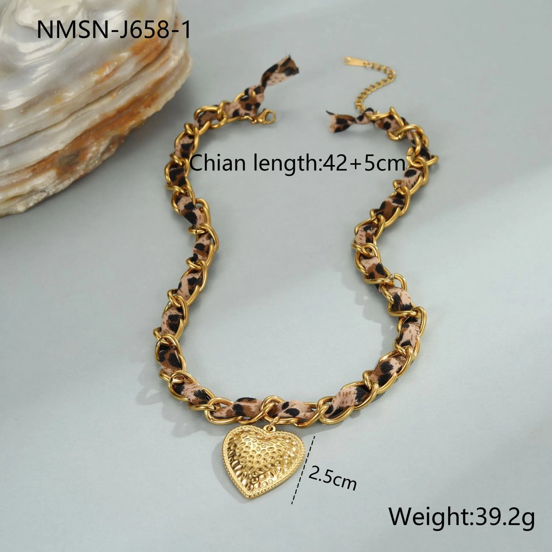 Gold-plated stainless steel necklace with leopard and love geometric pendant on an adjustable chain.