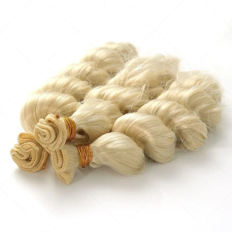Golden synthetic hair weft in three lengths: 18in, 20in, 22in