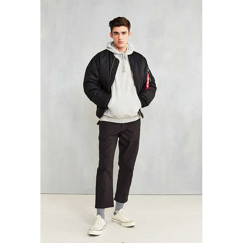 Men's army green loose fit cotton-padded bomber jacket with front zip and ribbed cuffs.