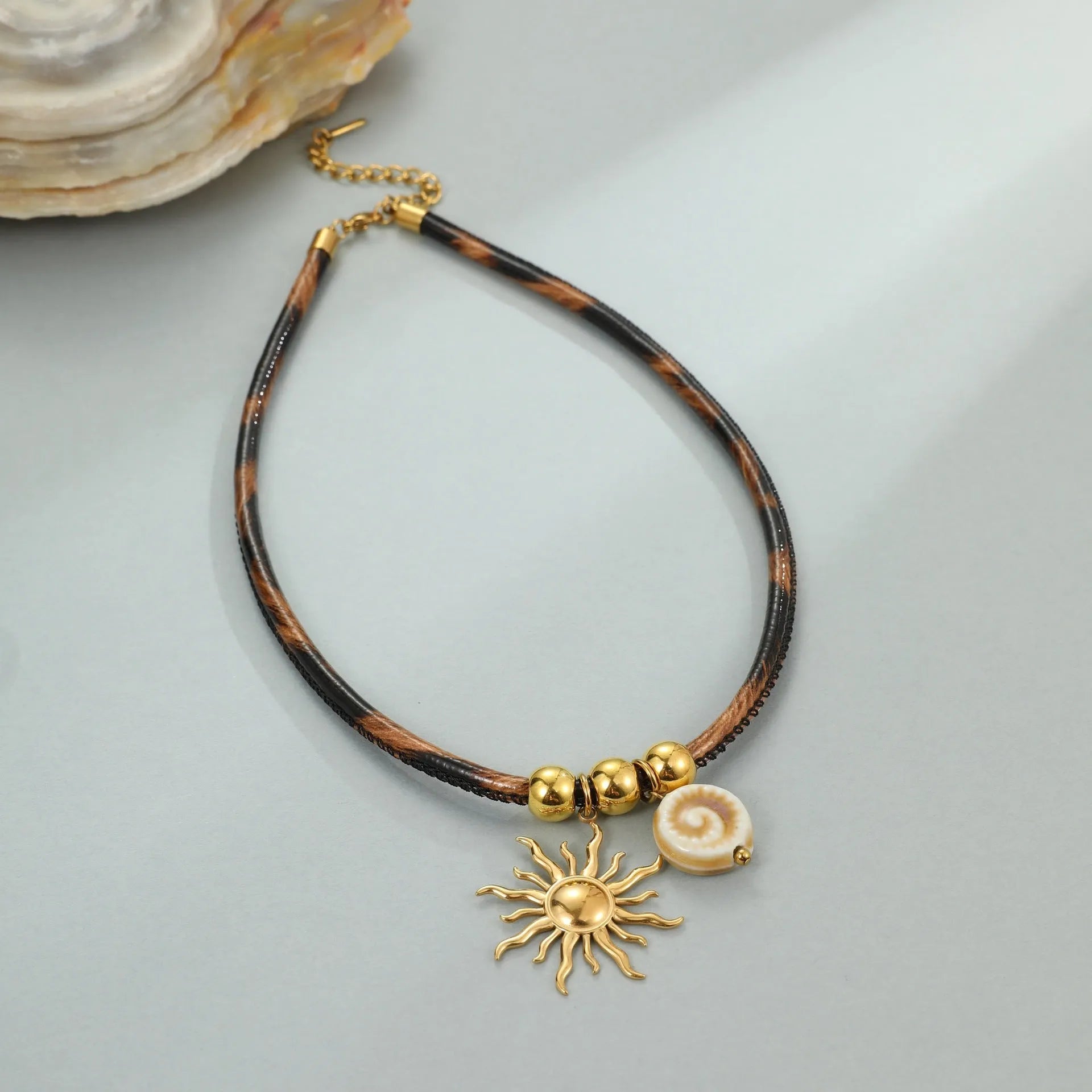 Women's leopard print geometric stainless steel necklace with 18K gold plating on adjustable chain
