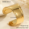 Women's exaggerated wide stainless steel bracelet with geometric wave design and niche opening in gold finish