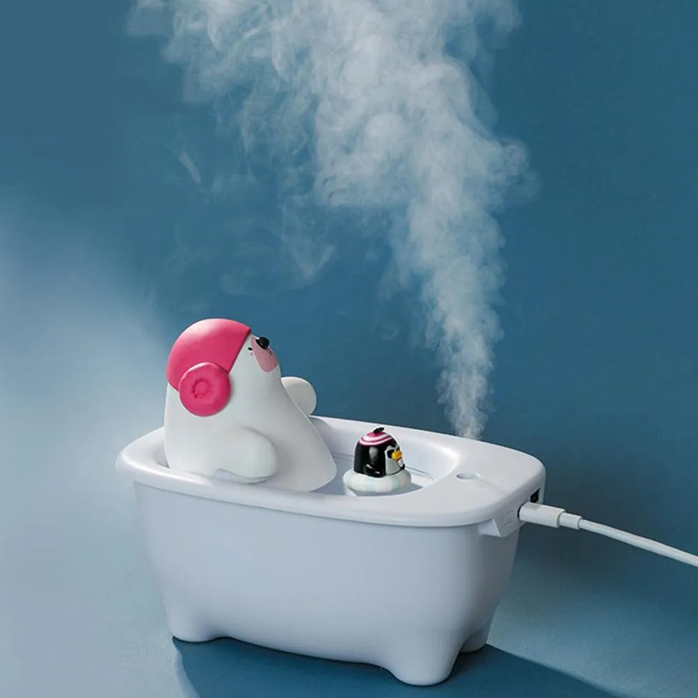 White USB air humidifier with 550ml water tank and adjustable mist settings for desk use