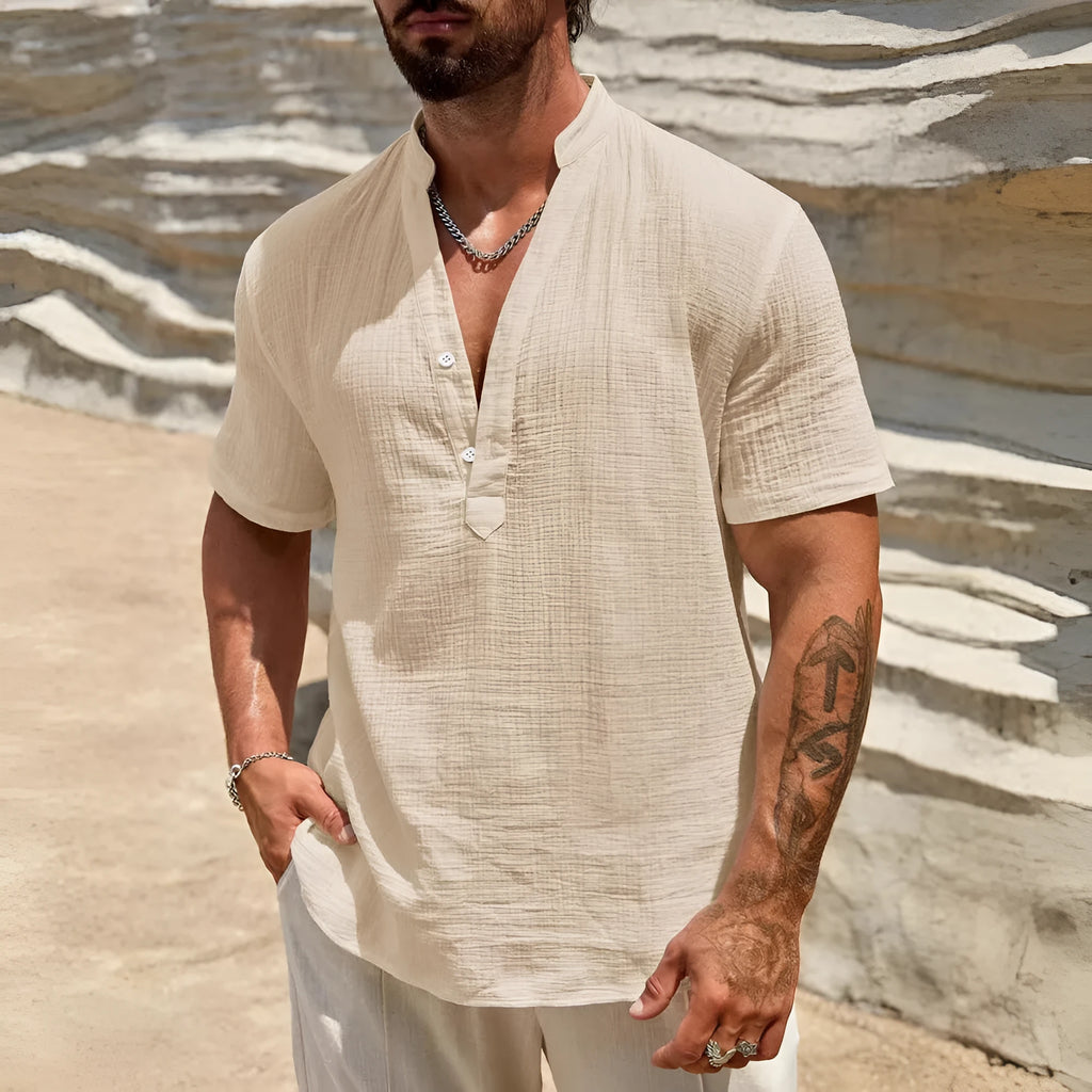 Men's solid colour short-sleeved shirt with a stand collar on a hanger