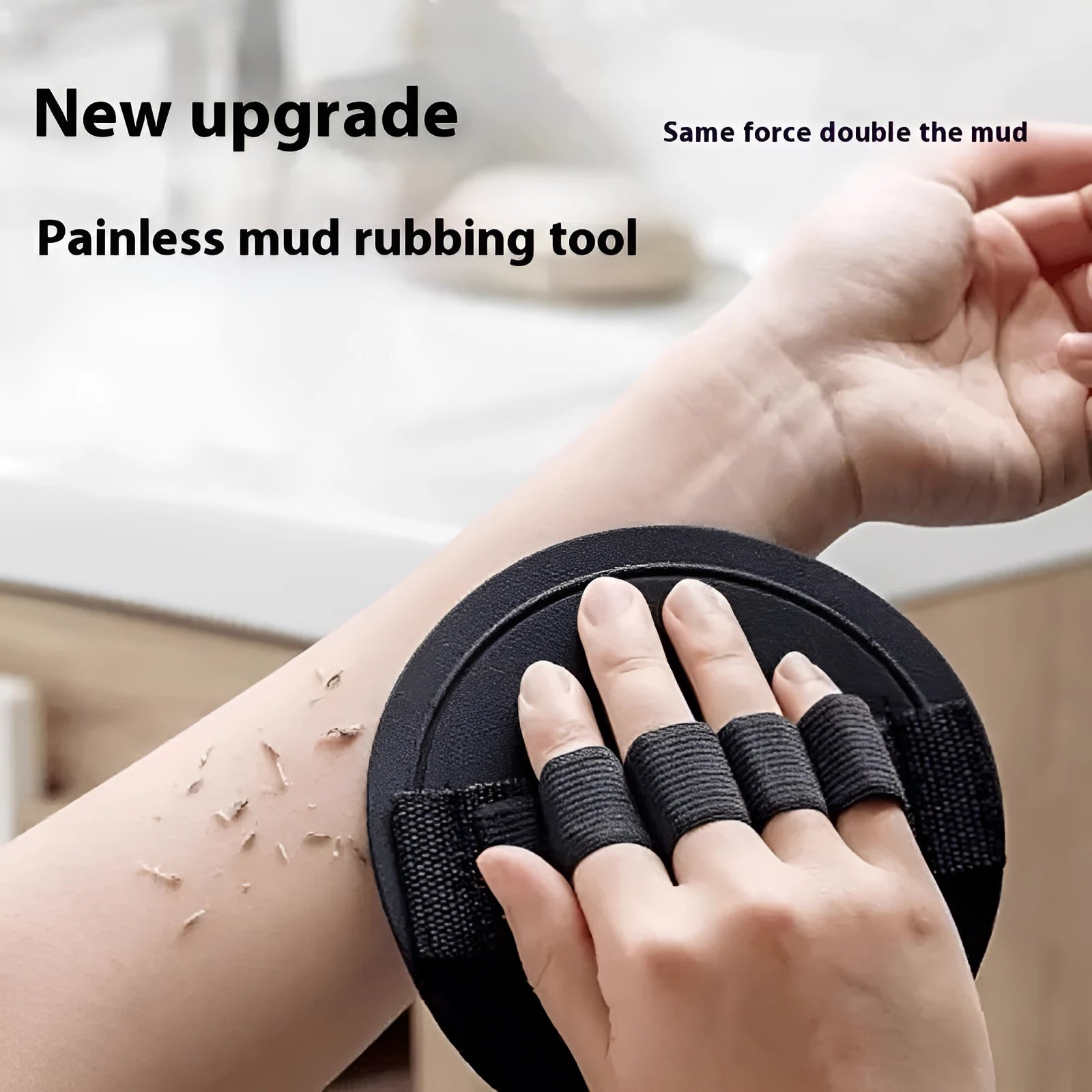 Rubber finger style massage gadget in round cake colour with bath towel
