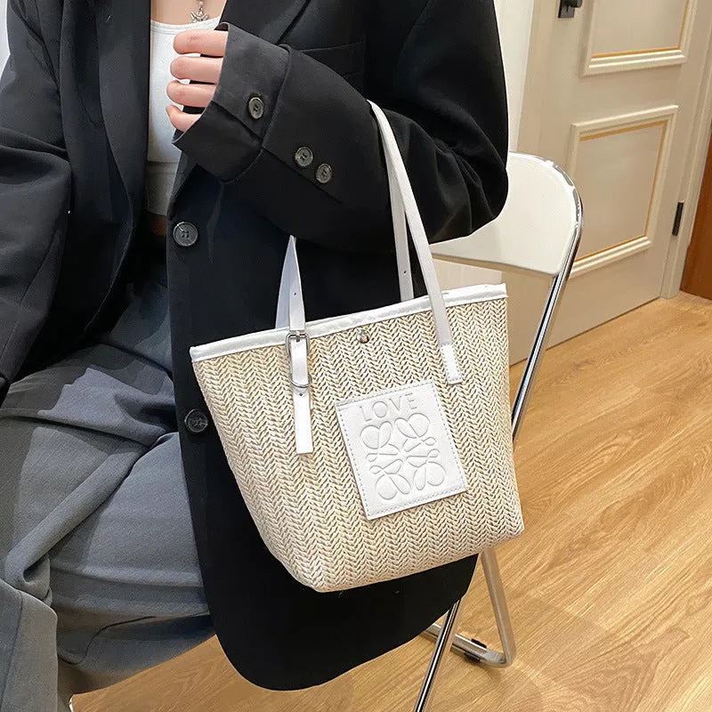 Straw woven women's shoulder bag in retro style with three-dimensional pocket