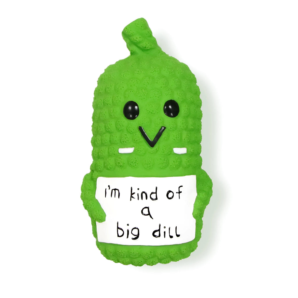 Green pickle-shaped latex dog chew toy with textured surface and squeaker.