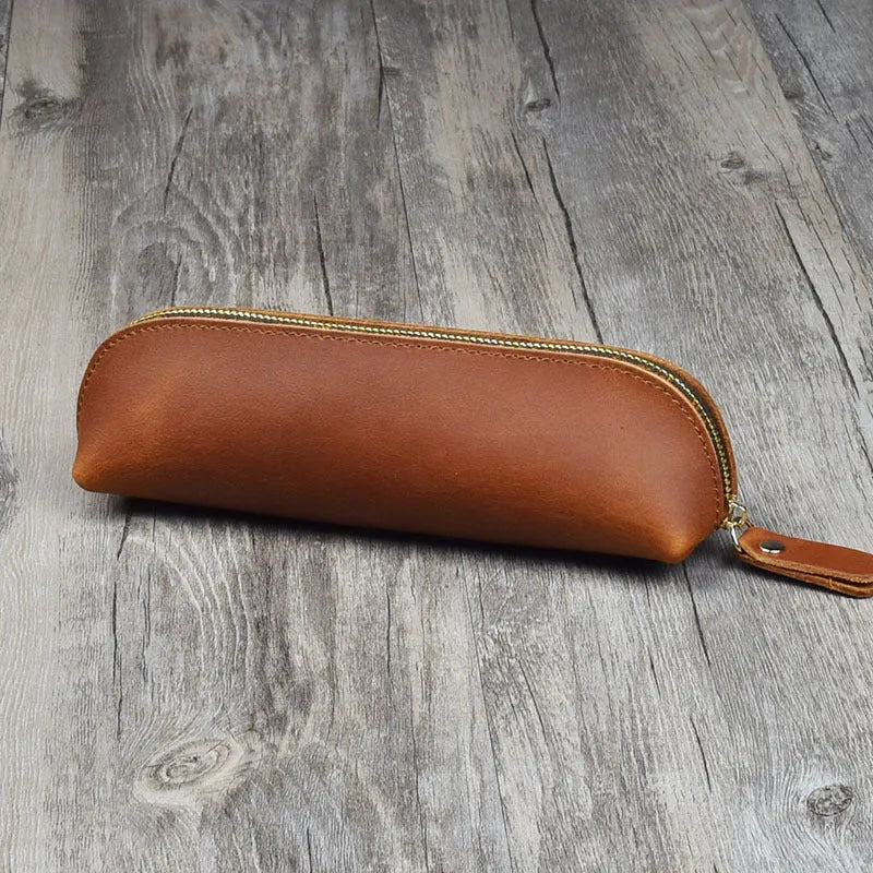 Square leather pencil case with zipper closure in black, brown, dark brown, or yellow colour