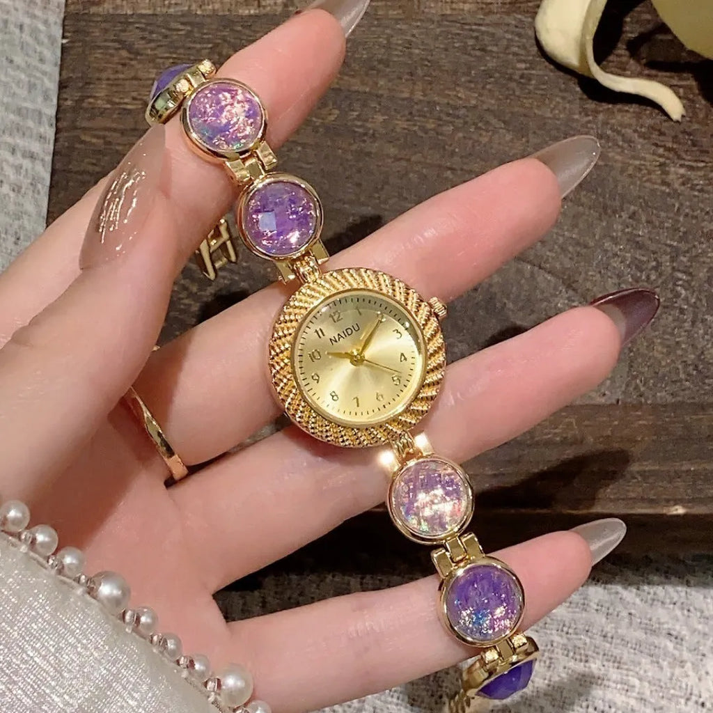 Women's 25mm round quartz watch in zinc alloy case showing six colour options