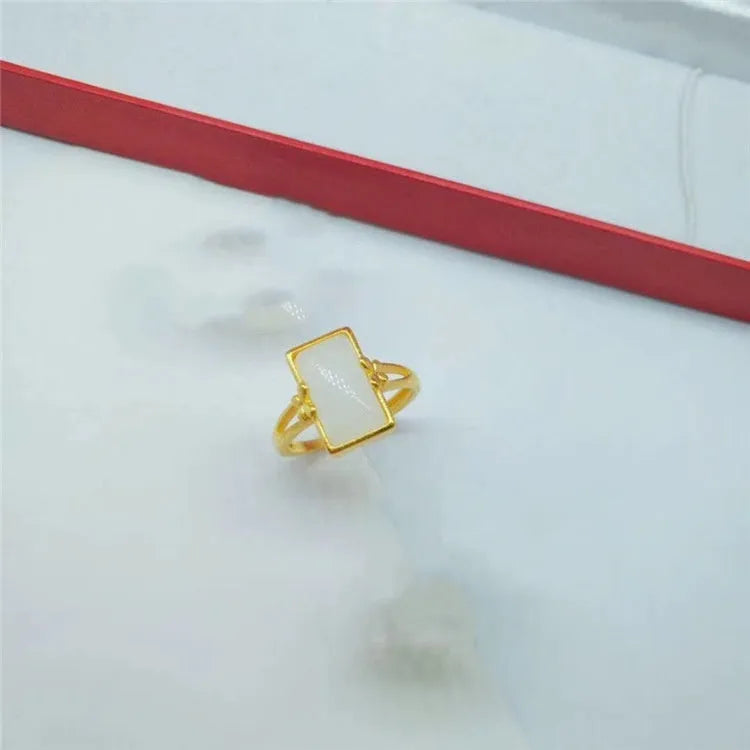 Adjustable brass gold-plated ring with long gemstone in national style design