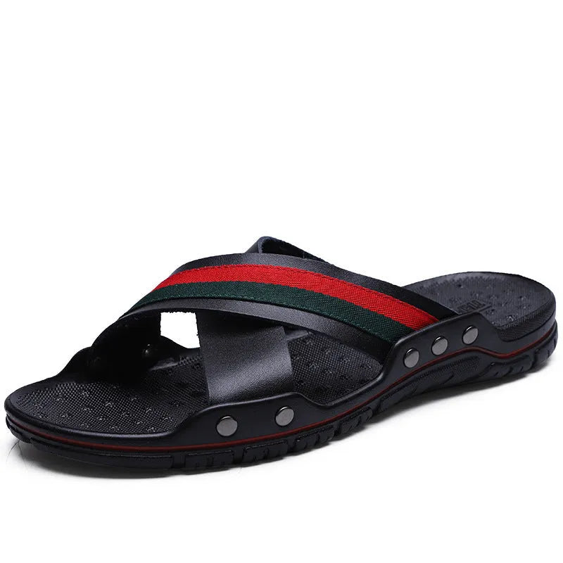 Men's cowhide leather beach sandals in white, shown from a side angle on a sandy background.