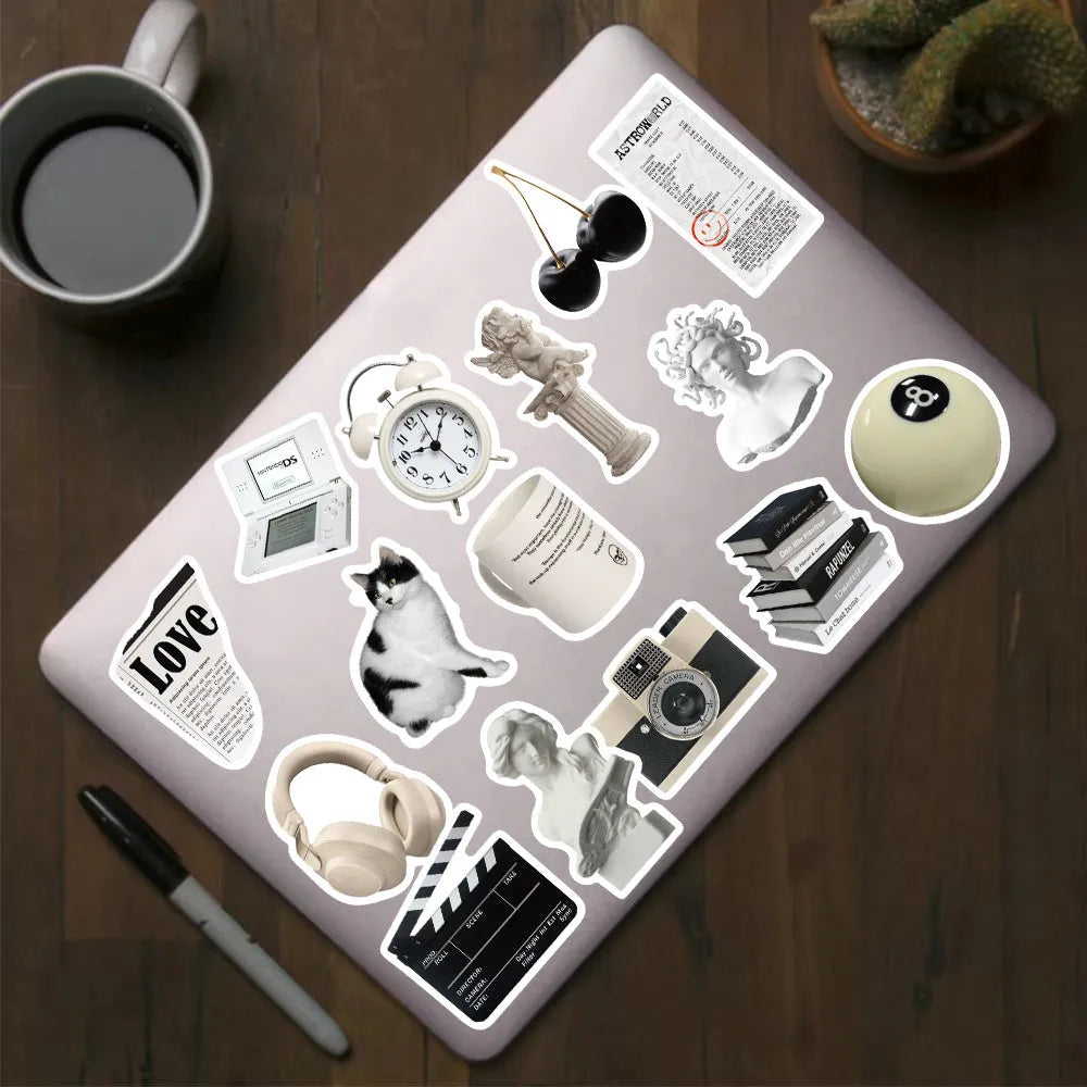 61-piece pack of black and white simple design PVC waterproof stickers for laptops and phones.