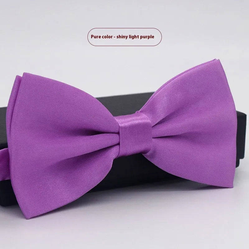 Men's flat head solid colour bow tie in polyester, showing 12cm by 6cm size on a background.