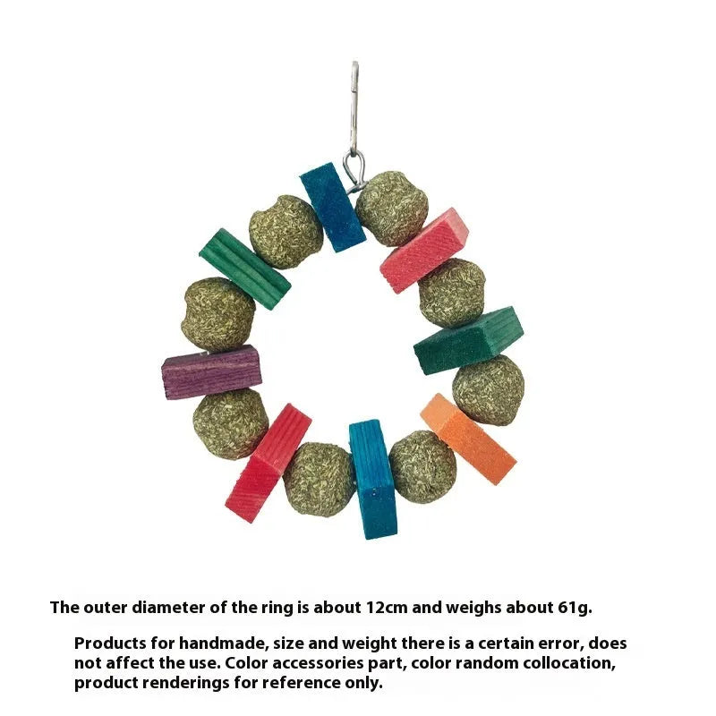 Hamster chew toy with a straw ball ring and natural applewood molar rod on a white background.