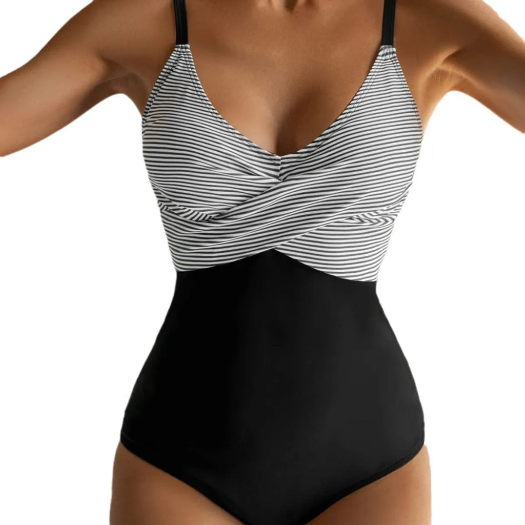 Printed split backless bikini swimsuit with lace-up gather detail in polyester fabric showing floral pattern