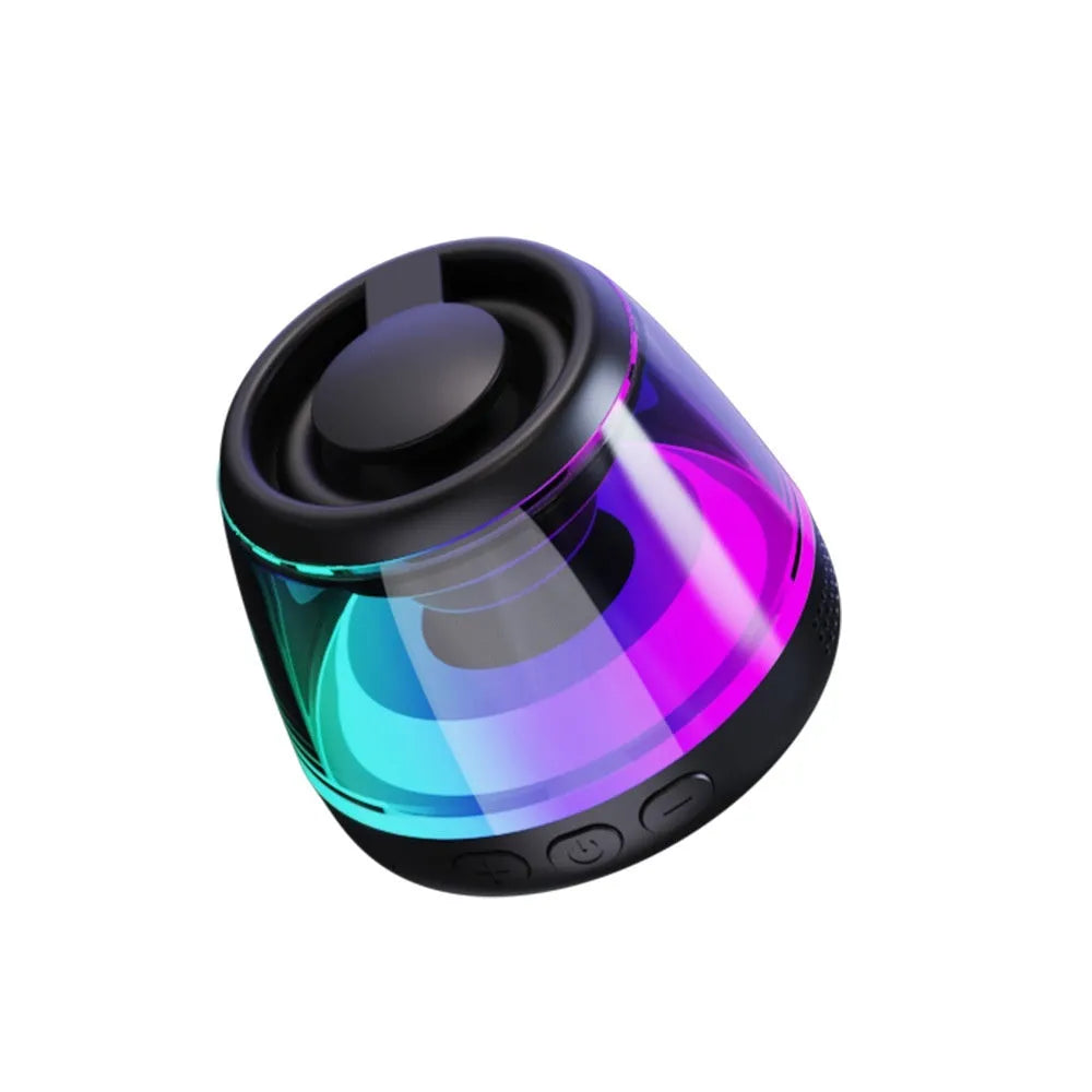 Compact portable Bluetooth speaker with ambient light ring and magnetic base in black or white